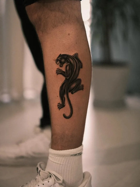 Medium Blackwork Panther Tattoo on Men Leg by @ego.romantic