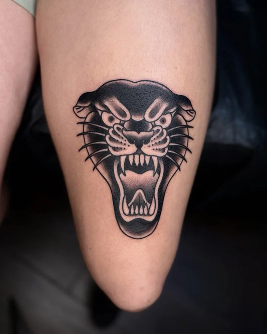 Medium Blackwork Panther Tattoo on Women Thigh by @erickforemantattoos