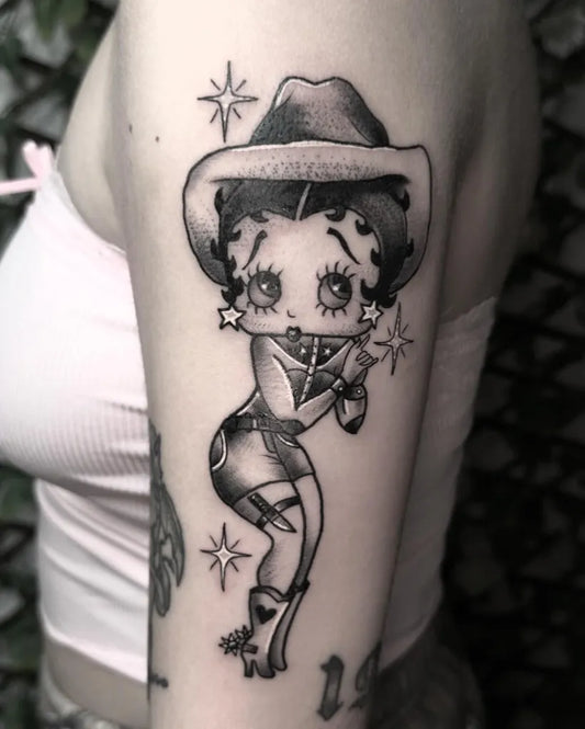 Medium Blackwork Pin Up Girl Betty Boop Tattoo on Women Arm by @antclaytattoo