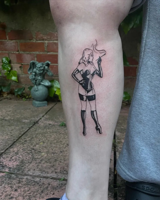 Medium Blackwork Pin Up Girl Gargoyle Tattoo on Women Leg by @fetish.tattoos