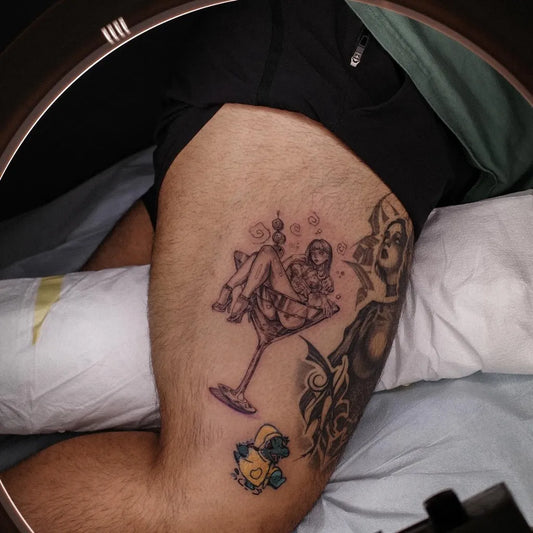 Medium Blackwork Pin Up Girl Martini Glass Tattoo on Men Thigh by @munzlings