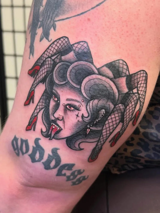 Medium Blackwork Pin Up Girl Medusa Tattoo on Women Arm by @indigotattz