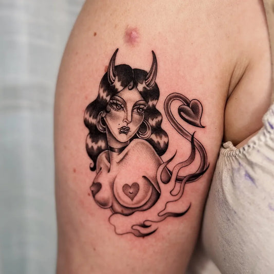Medium Blackwork Pin Up Girl with Devil Horns Tattoo on Women Arm by @laurynjenesis