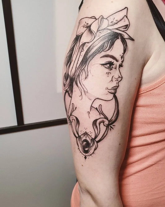 Medium Blackwork Pin Up Girl with Floral Headscarf Tattoo on Women Upper Arm by @viktoriagolebowska