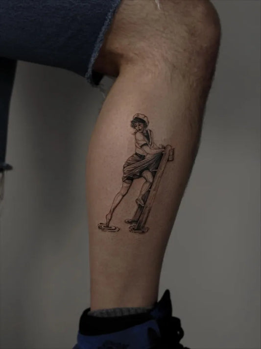 Medium Blackwork Pin Up Girl with Staff Tattoo on Men Leg by @ternotattoo