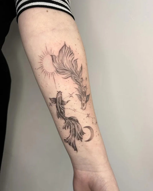 Medium Blackwork Pisces Fish and Sun Tattoo on Women Arm by @lucybethantattoos