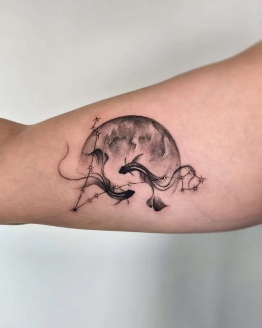 Medium Blackwork Pisces Koi Moon Tattoo on Women Arm by @legalpics