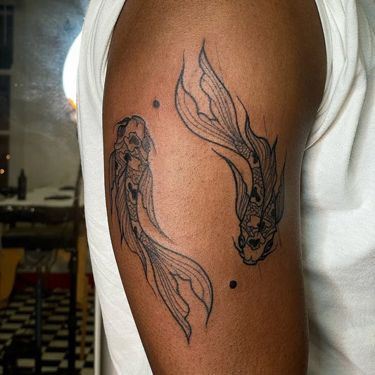 Medium Blackwork Pisces Tattoo on Men Arm by @chxrlieseye.ttt
