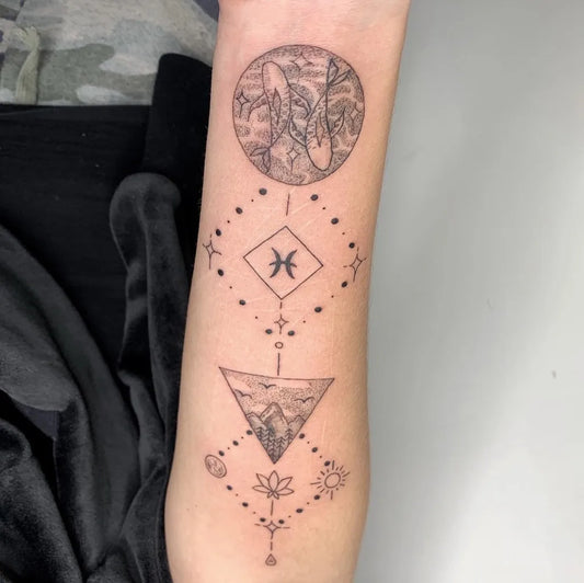 Medium Blackwork Pisces Zodiac and Landscape Tattoo on Women Forearm by @inkslayer69