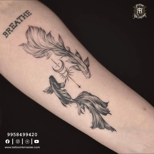 Medium Blackwork Pisces and Crescent Tattoo on Women Arm by @tattooinkmaster27