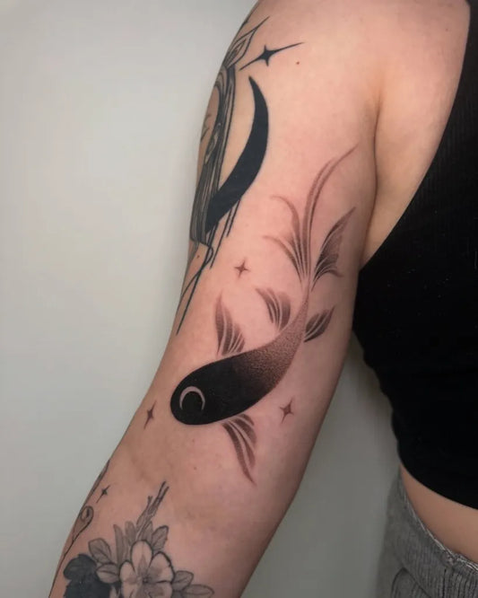 Medium Blackwork Pisces and Moon Tattoo on Women Arm by @xinaink