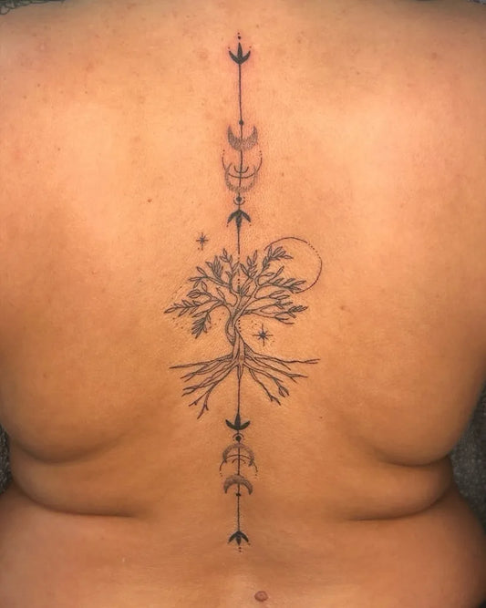 Medium Blackwork Poison Tree with Crescent Moons and Arrows on Women Back Tattoo by @kismetbeautypmu