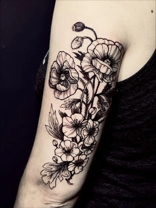 Medium Blackwork Poppy Flowers Tattoo on Women Arm by @velvet___ghost