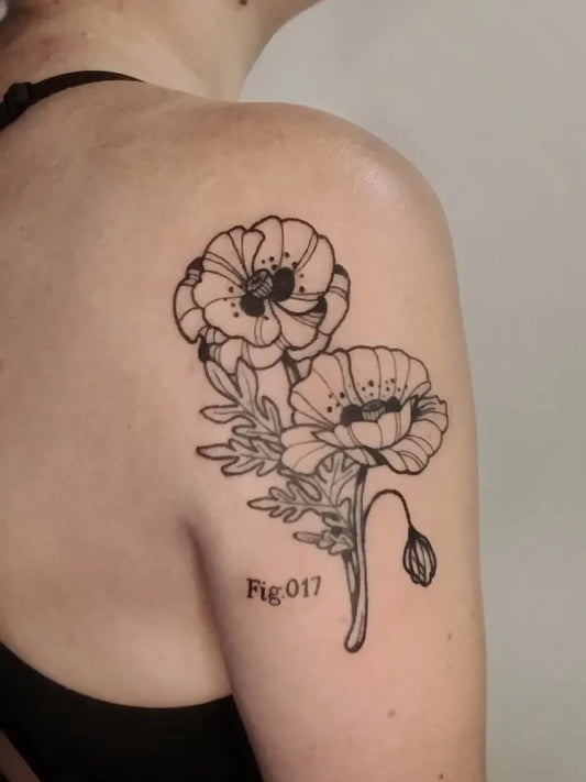 Medium Blackwork Poppy Flowers Tattoo on Women Shoulder by @addamz.tattoos