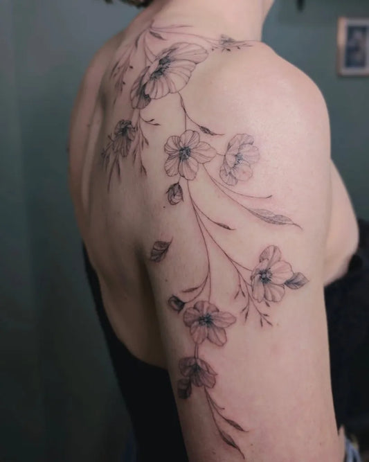 Medium Blackwork Poppy Flowers Tattoo on Women Shoulder by @bleuepine