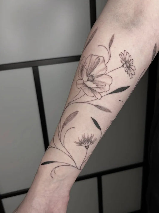 Medium Blackwork Poppy and Daisies Tattoo on Women Arm by @simkiwi.ink
