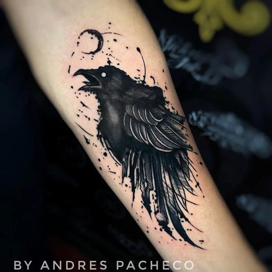 Medium Blackwork Raven and Splatter on Women Arm Tattoo by @victoriainktattoo