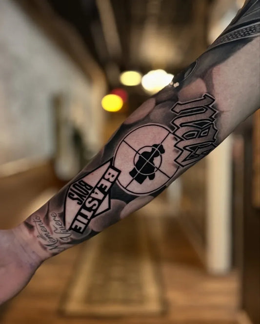 Medium Blackwork Resist Logo Music Tattoo on Men Arm by @felleti_1nk