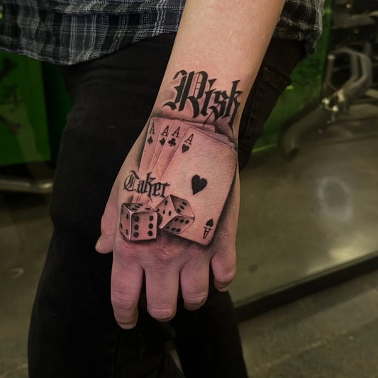 Medium Blackwork Risk Poker Dice Tattoo on Women Wrist by @diamonds.tattoo1