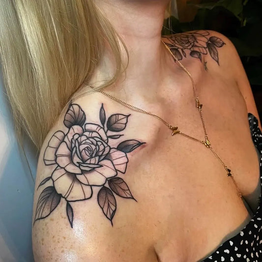 Medium Blackwork Rose Tattoo on Women Shoulder by @staceymactattoos