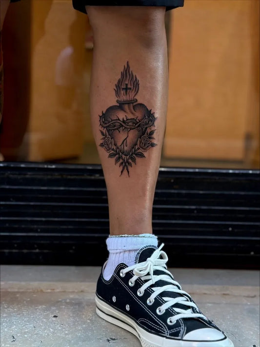 Medium Blackwork Sacred Heart Tattoo on Men Leg by @inkaddictiontattoo_vr