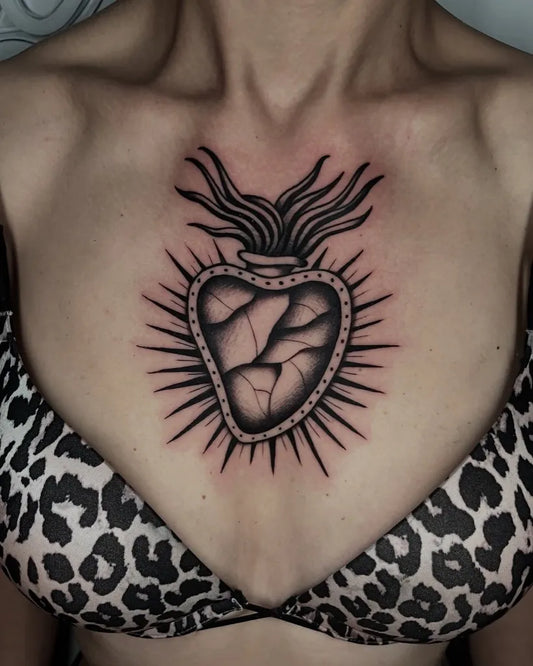 Medium Blackwork Sacred Heart Tattoo on Women Chest by @luca.capitano_c4