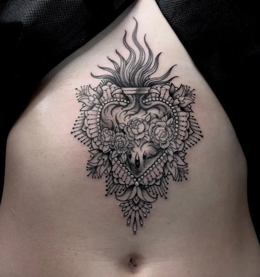 Medium Blackwork Sacred Heart with Flowers Tattoo on Women Abdomen by @m1ss_juliet