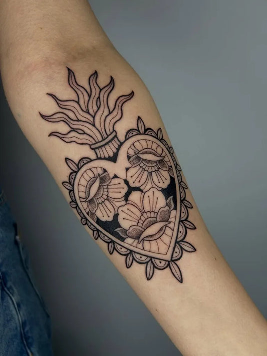 Medium Blackwork Sacred Heart with Flowers Tattoo on Women Arm by @gpearsontat