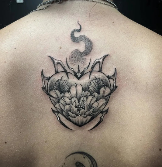 Medium Blackwork Sacred Heart with Spikes and Smoke Tattoo on Women Back by @martino_ds