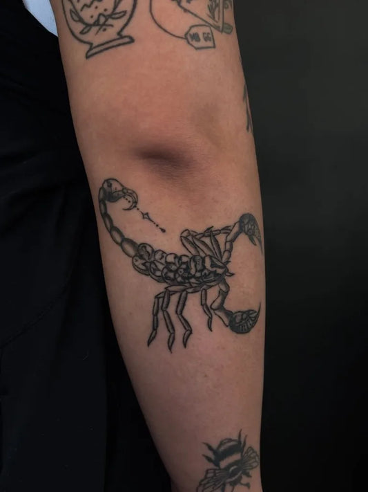 Medium Blackwork Scorpion on Women Arm Tattoo by @venusflytatts