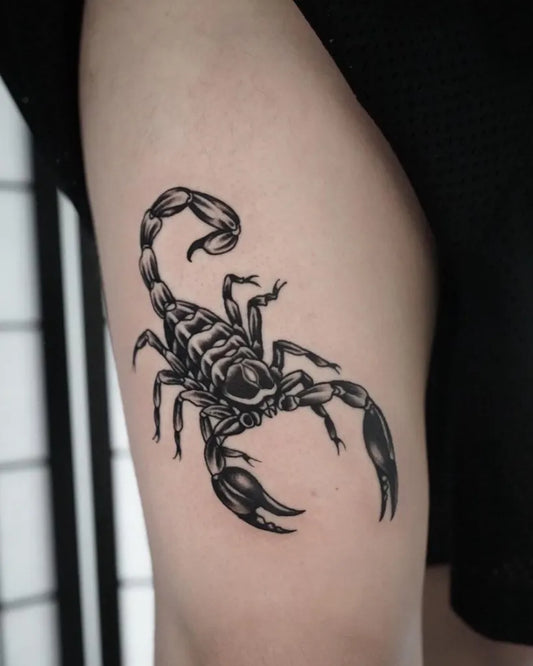 Medium Blackwork Scorpion on Women Thigh Tattoo by @riversidetattoolondon
