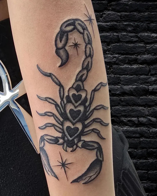 Medium Blackwork Scorpion with Hearts on Women Arm Tattoo by @mr.inkwells