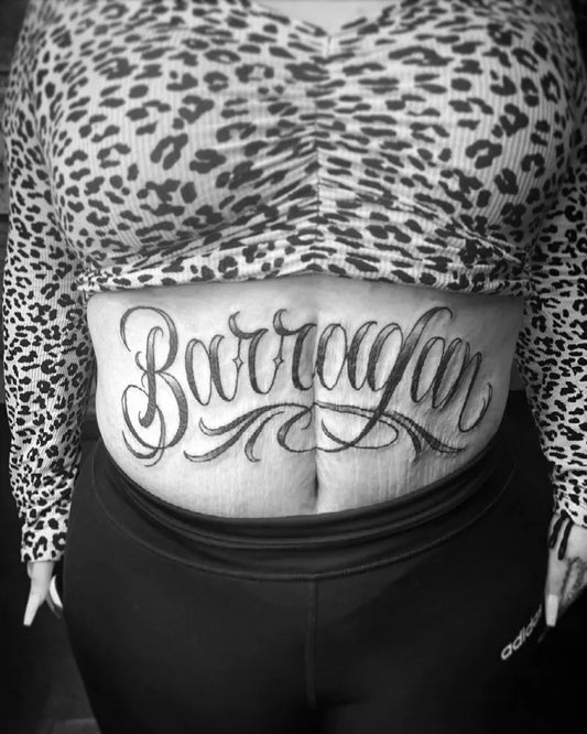 Medium Blackwork Script Name Tattoo on Women Stomach by @durtybreed
