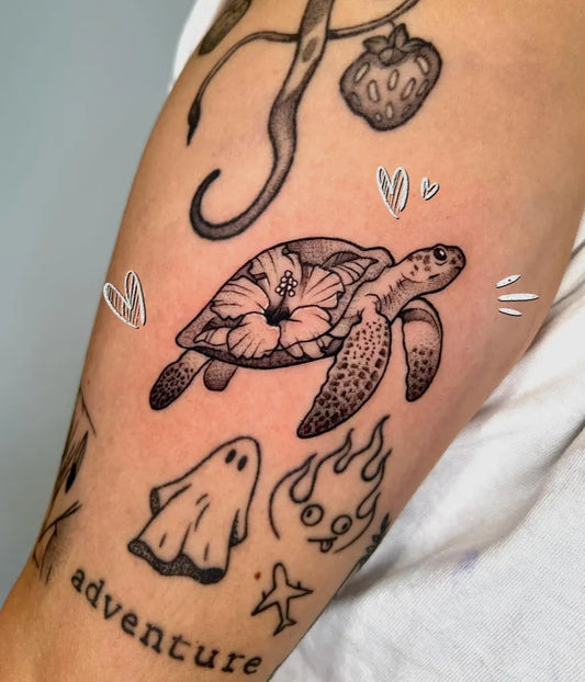 Medium Blackwork Sea Turtle Ghost Adventure Tattoo on Women Arm by @riisingink