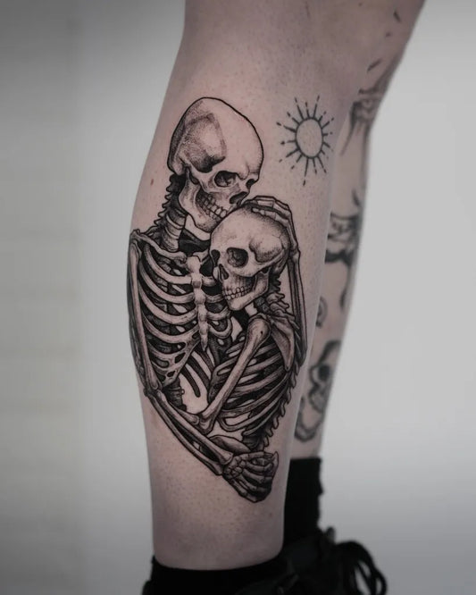 Medium Blackwork Skeleton Couple Tattoo on Women Thigh by @daan.ink