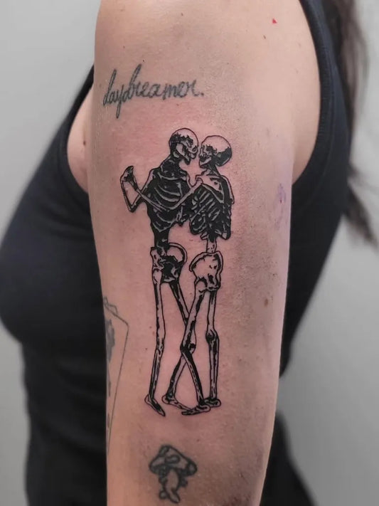 Medium Blackwork Skeleton Dance Tattoo on Women Upper Arm by @attackonbash