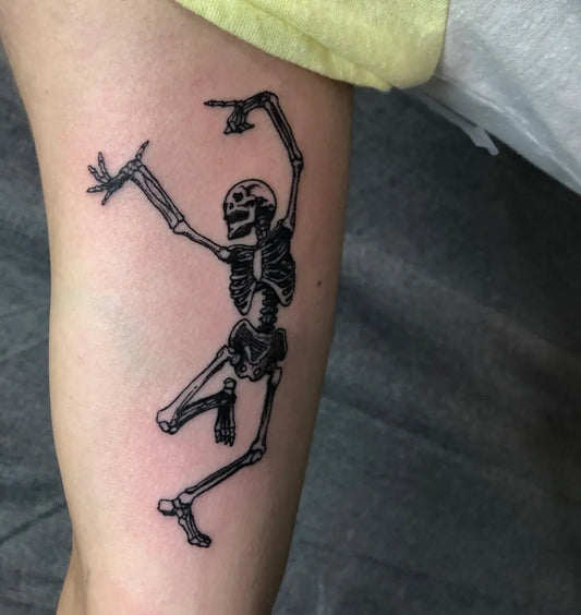 Medium Blackwork Skeleton Dancing Tattoo on Women Thigh by @spacecattattoo