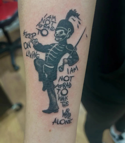 Medium Blackwork Skeleton Soldier with Lyrics Music Tattoo on Men Arm by @paganinkbysarahstreet