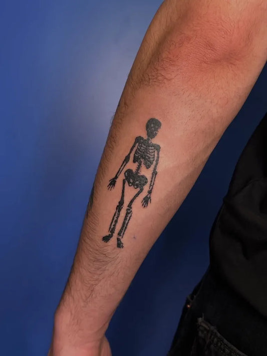 Medium Blackwork Skeleton Tattoo on Men Arm by @bobby_davison
