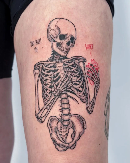 Medium Blackwork Skeleton with Heart Men Thigh Tattoo on Men Thigh by @sad_cid