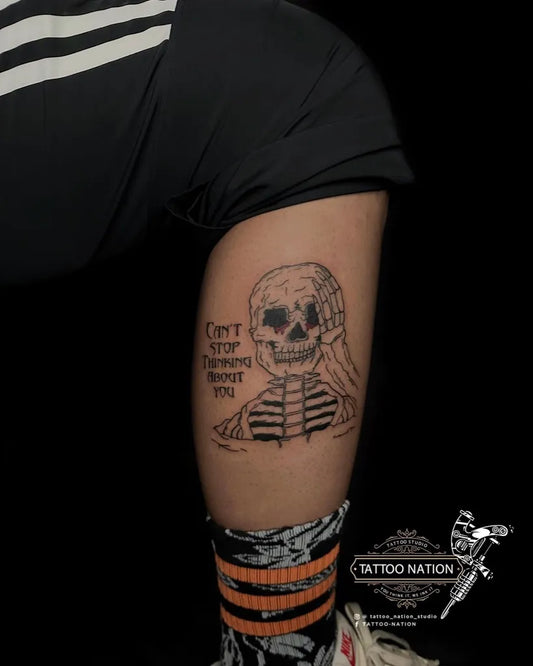 Medium Blackwork Skeleton with Text Tattoo on Men Thigh by @tattoo_nation_studio