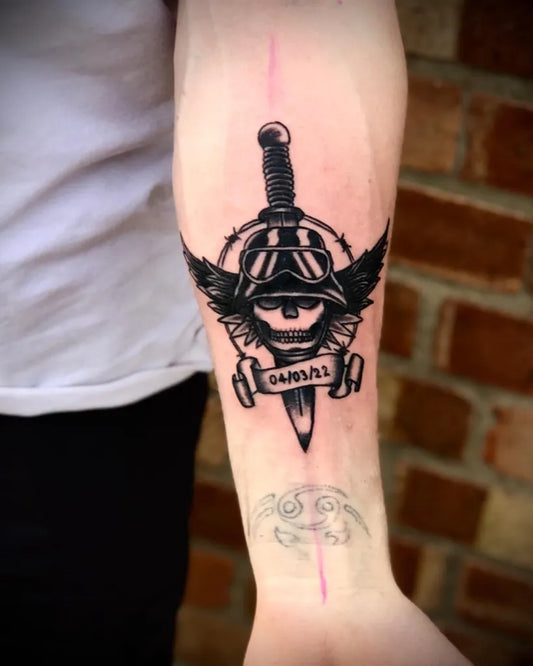 Medium Blackwork Skull Dagger Wings Military Tattoo on Men Arm by @ink_daz