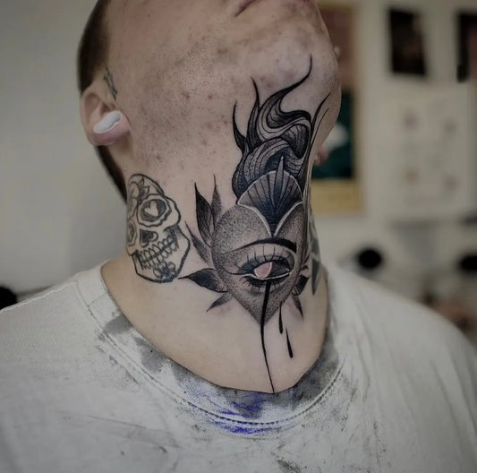 Medium Blackwork Skull Heart Eye Tattoo on Men Throat by @starrtattoosupplies