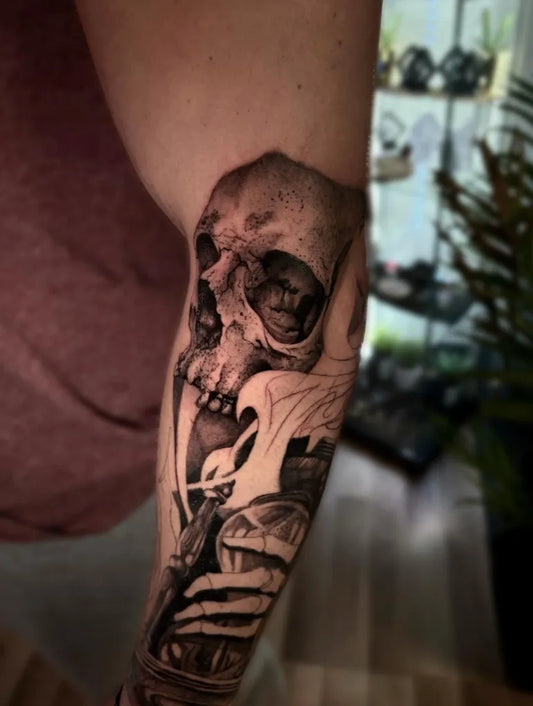 Medium Blackwork Skull Wings Fingers on Men Arm Tattoo by @tattoobillythekid