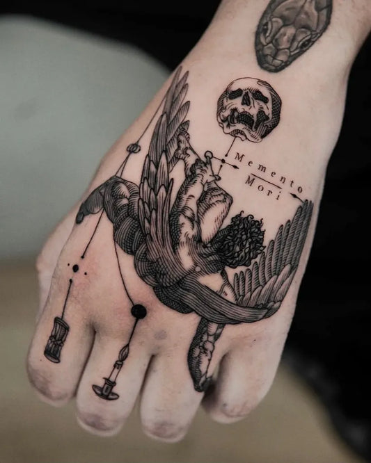 Medium Blackwork Skull Wings Memento Mori Spiritual Tattoo on Men Hand by @ave_lights