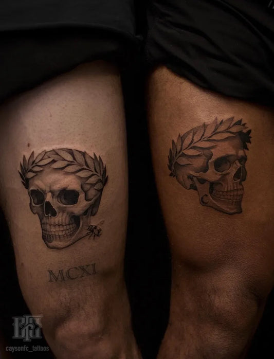 Medium Blackwork Skull and Laurel Wreath Tattoo on Men Thigh by @caysonfc_tattoos