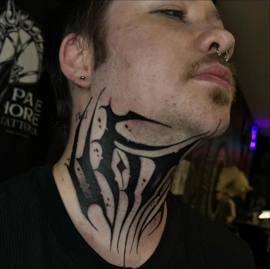 Medium Blackwork Skull and Spikes Tattoo on Men Throat by @iamkurseone