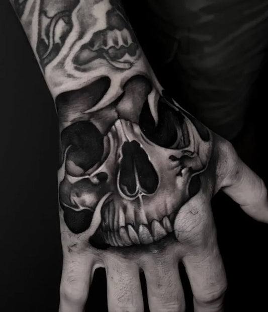 Medium Blackwork Skull on Men Hand Tattoo by @tattoos_by_bear