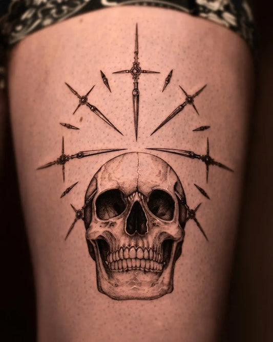 Medium Blackwork Skull with Spikes on Women Thigh Tattoo by @amila.ink