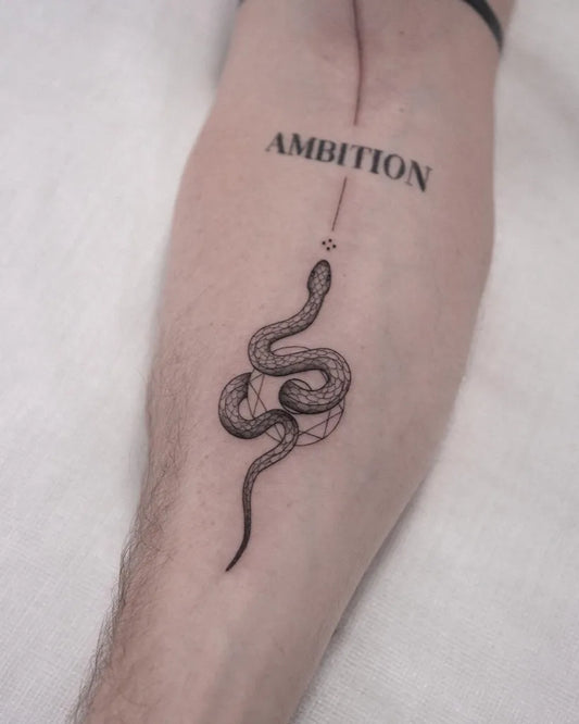 Medium Blackwork Snake and Ambition Tattoo on Men Arm by @tattoo.ines
